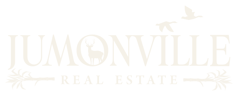 Jumonville Real Estate crest